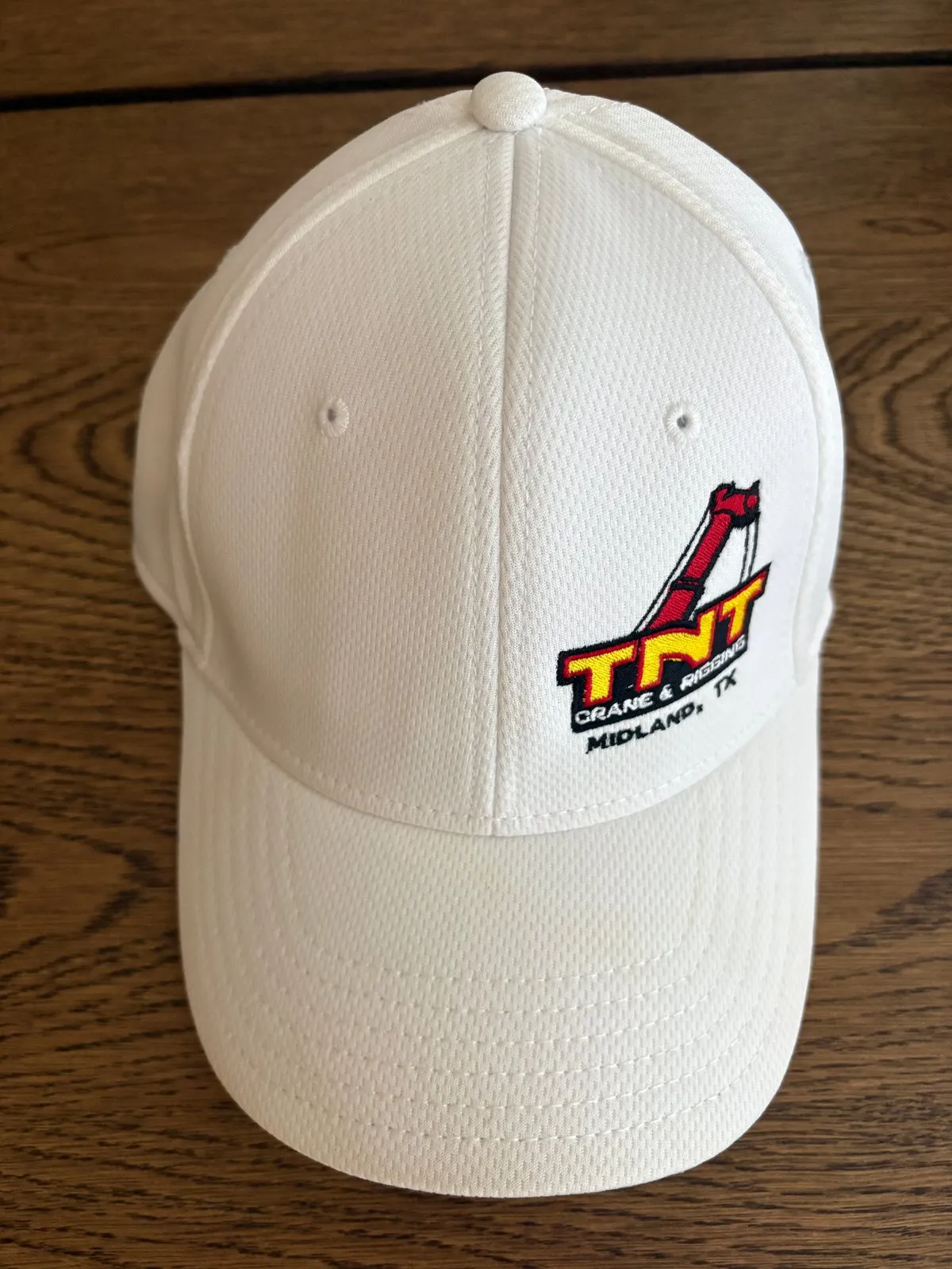 Retired white TNT hat